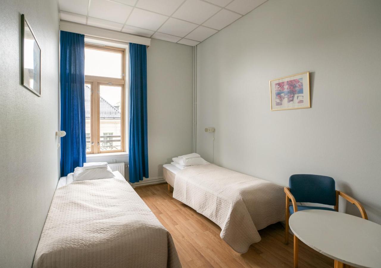 Camera Budget Doppia con Letti Singoli con Bagno in Comune